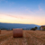 naplemente · farm · mező · széna · égbolt · tájkép - stock fotó © Fesus