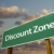 Discount Zone Green Road Sign and Clouds stock photo © feverpitch