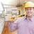 Contractor in Hard Hat Over Custom Kitchen Drawing and Photo stock photo © feverpitch