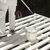 Painter Rolling White Paint Onto Top of Patio Cover stock photo © feverpitch