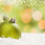 Green Christmas Ornaments on Snow Over an Abstract Background stock photo © feverpitch