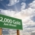 $2,000 Gold Green Road Sign and Clouds stock photo © feverpitch