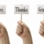 Three Signs In Fists Saying Merci, Thanks and Gracias stock photo © feverpitch