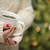 Woman with Red and Green Nail Polish Holding Cup of Coffee stock photo © feverpitch