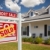 Sold Short Sale Real Estate Sign and House - Left stock photo © feverpitch