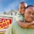 отцом · сына · недвижимости · знак · домой · счастливым · афроамериканец - Сток-фото © feverpitch