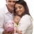 Young Mixed Race Parents with Baby Holding Piggy Bank stock photo © feverpitch