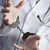 Doctor or Nurse In Handcuffs Wearing Lab Coat and Stethoscope stock photo © feverpitch