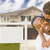African American Father and Mixed Race Son In Front of Blank Real Estate Sign and House stock photo © feverpitch