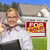 Real Estate Agent in Front of Sold Sign and House stock photo © feverpitch