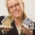 Woman Holding Two Houses stock photo © feverpitch