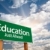 Education Green Road Sign Over Clouds stock photo © feverpitch
