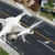 Unmanned Aircraft System (UAV) Quadcopter Drone In The Air Over  stock photo © feverpitch