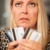 Upset Woman Glaring At Her Many Credit Cards stock photo © feverpitch
