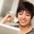 улыбаясь · женщину · кредитных · карт · используя · ноутбук - Сток-фото © feverpitch
