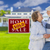 Sold Real Estate Sign with Senior Couple in Front of House stock photo © feverpitch