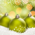 Green Christmas Ornaments on Snow Over an Abstract Background stock photo © feverpitch