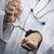 Doctor or Nurse In Handcuffs Wearing Lab Coat and Stethoscope stock photo © feverpitch