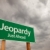 Jeopardy Green Road Sign Over Storm Clouds stock photo © feverpitch