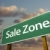 Sale Zone Green Road Sign and Clouds stock photo © feverpitch