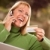 Cheerful Woman on Phone and Laptop with Credit Card stock photo © feverpitch