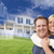 Hugging Couple with Ghosted House Drawing Behind stock photo © feverpitch
