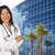 Attractive Hispanic Doctor or Nurse in Front of Building stock photo © feverpitch