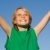 happy smiling kid child boy with arms raised in happiness stock photo © godfer