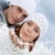 young couple blowing christmas or new years eve wishes stock photo © godfer