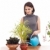 Woman watering a plant stock photo © grafvision