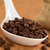 Coffee Beans on Ceramic Spoon stock photo © ildi