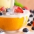 Pouring Milk Over Wholewheat Cereal with Fresh Fruits stock photo © ildi