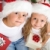 Christmas kids with santa hats and presents stock photo © ilona75