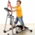 Smiling boy on elliptical trainer in the gym stock photo © ilona75