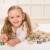 Little girl with alphabet wooden blocks playing stock photo © ilona75