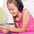 年輕的女孩 · 聽音樂 · 智能手機 · 地板 · 微笑 - 商業照片 © ilona75