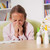 Young girl sneezing at home with paper towel prepared to blow he stock photo © ilona75