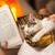 Woman reading by the fire and comforting her rescue kitten stock photo © ilona75
