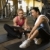 Woman with trainer at gym. stock photo © iofoto