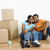 Portrait of couple with boxes. stock photo © iofoto