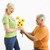 男子 · 女子 · 花束 · 中年 · 膝蓋 · 黃色的花 - 商業照片 © iofoto