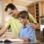 Father Helping Son with Homework stock photo © iofoto