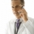 médico · teléfono · celular · retrato · caucásico · doctor · de · sexo · masculino · estetoscopio - foto stock © iofoto