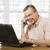 Mature man with laptop. stock photo © iofoto