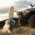 Woman and Dog by SUV at the Beach stock photo © iofoto
