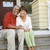 Couple Sitting on Outdoor Steps of Home Smiling stock photo © iofoto