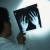 Doctor examining x-rays. stock photo © iofoto