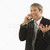 Groom talking on cellphone. stock photo © iofoto