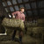 Man in Barn Moving Bales of Hay stock photo © iofoto