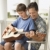 Father and Son Playing Guitar stock photo © iofoto